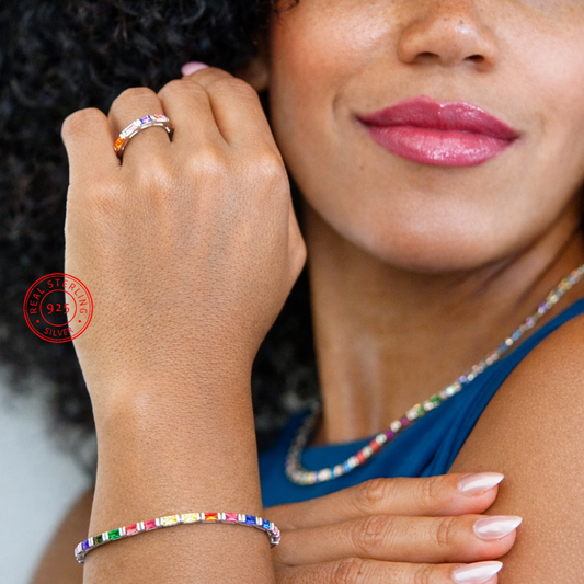 Woman wearing a colorful beaded bracelet and ring, with a visible S925 stamp.