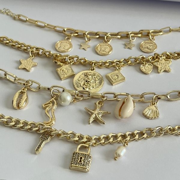 Gold plated chain and charms bracelet