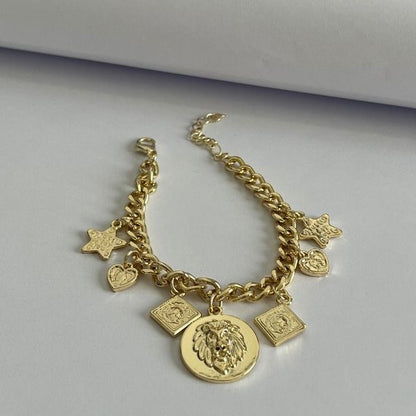 Gold plated chain and charms bracelet
